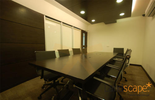 Wooden-drop-panel-hung-over-the-conference-table-in-the-board-room
